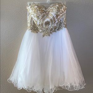 White dress with gold design